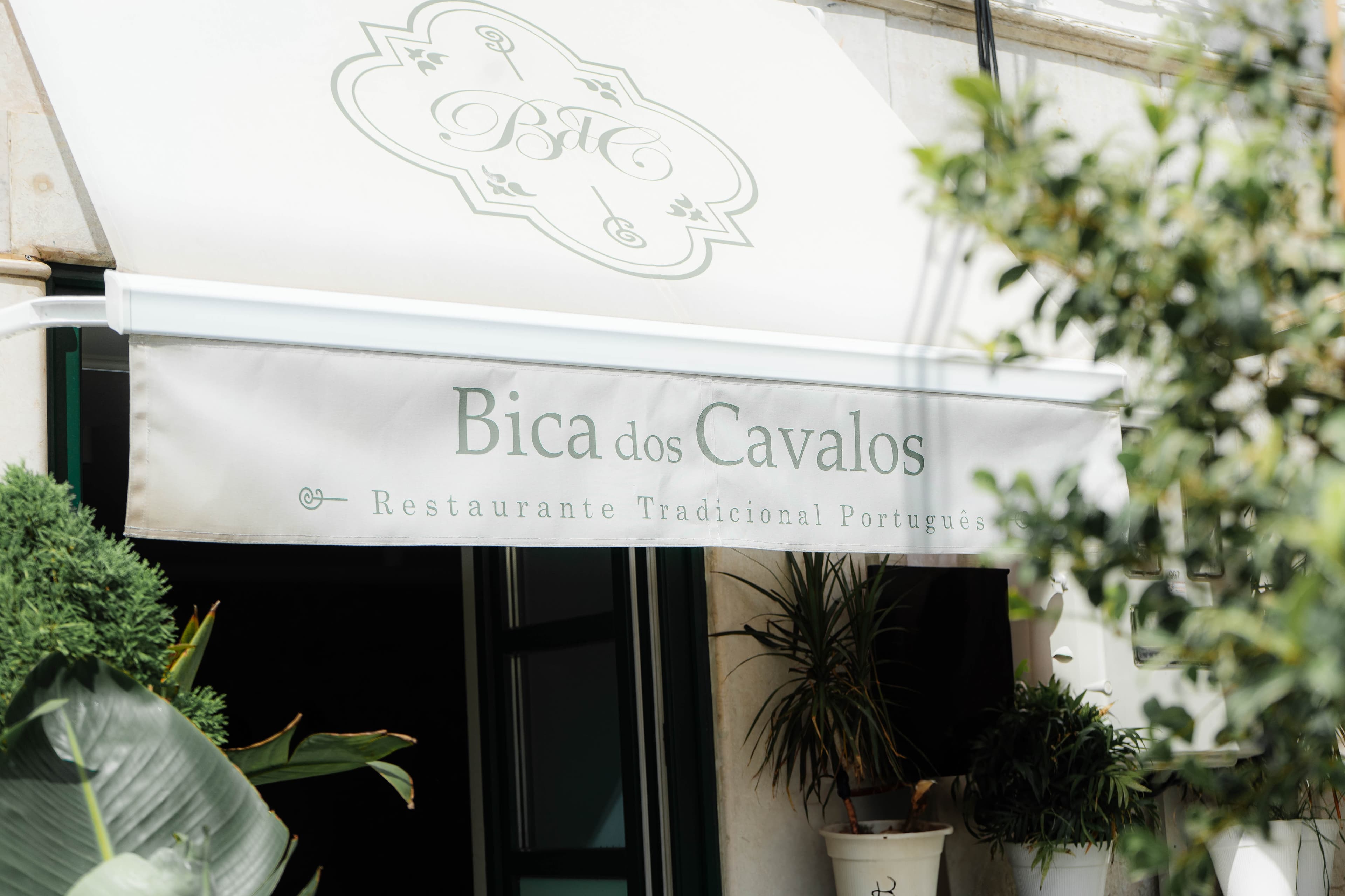 Bica dos Cavalos entrance, elegant traditional Portuguese restaurant in Alfama, Lisbon